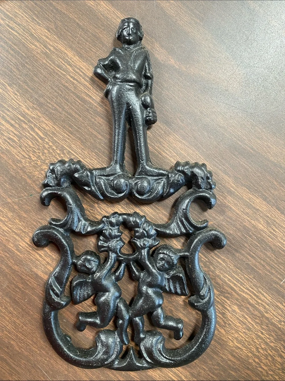 Vintage J.Z.H. T-11 1955 Black Cast Iron Trivet  Cupid Cherubs and Gentleman USA
